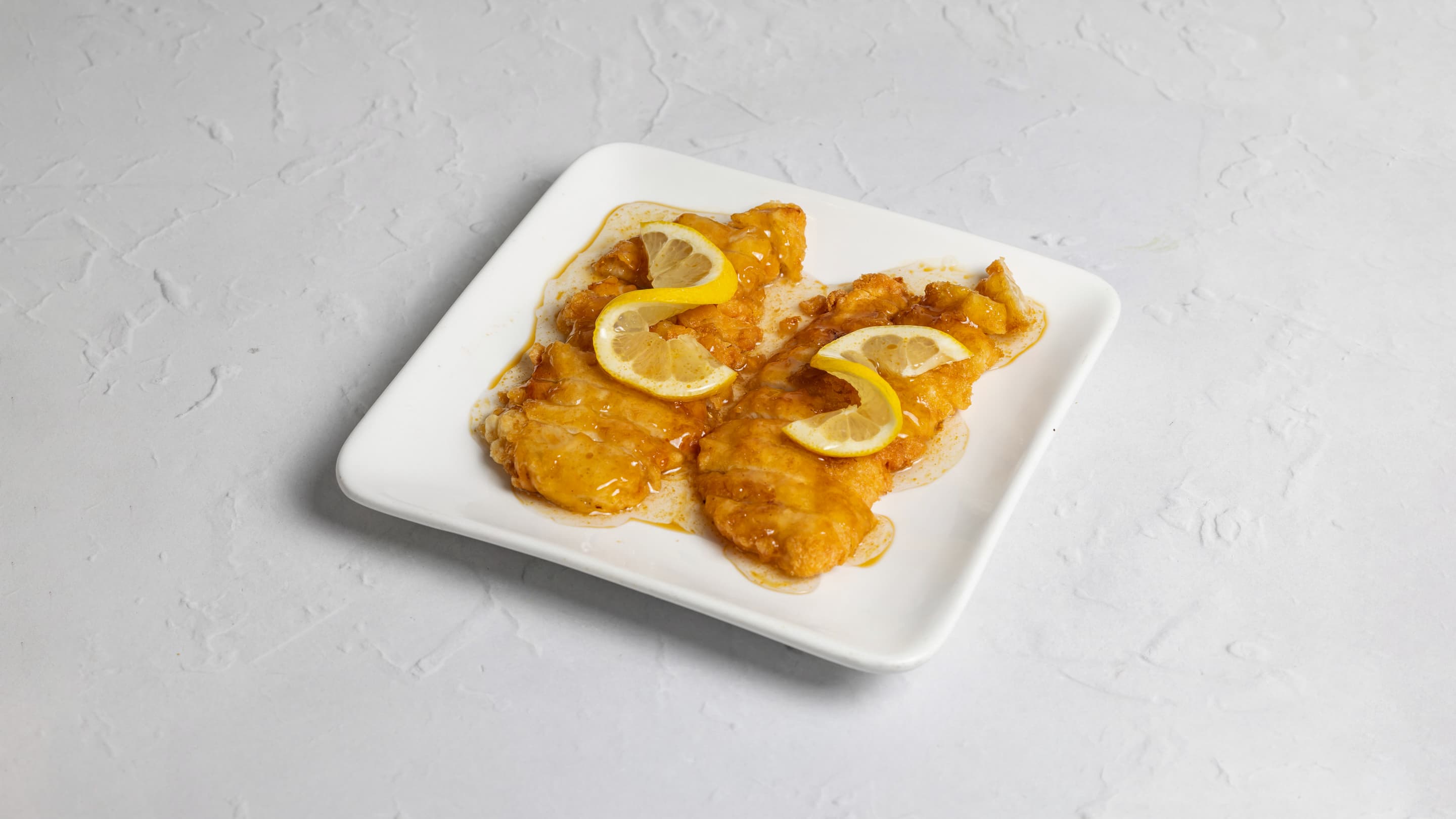 Chicken in lemon sauce at New Wok’s Cooking
