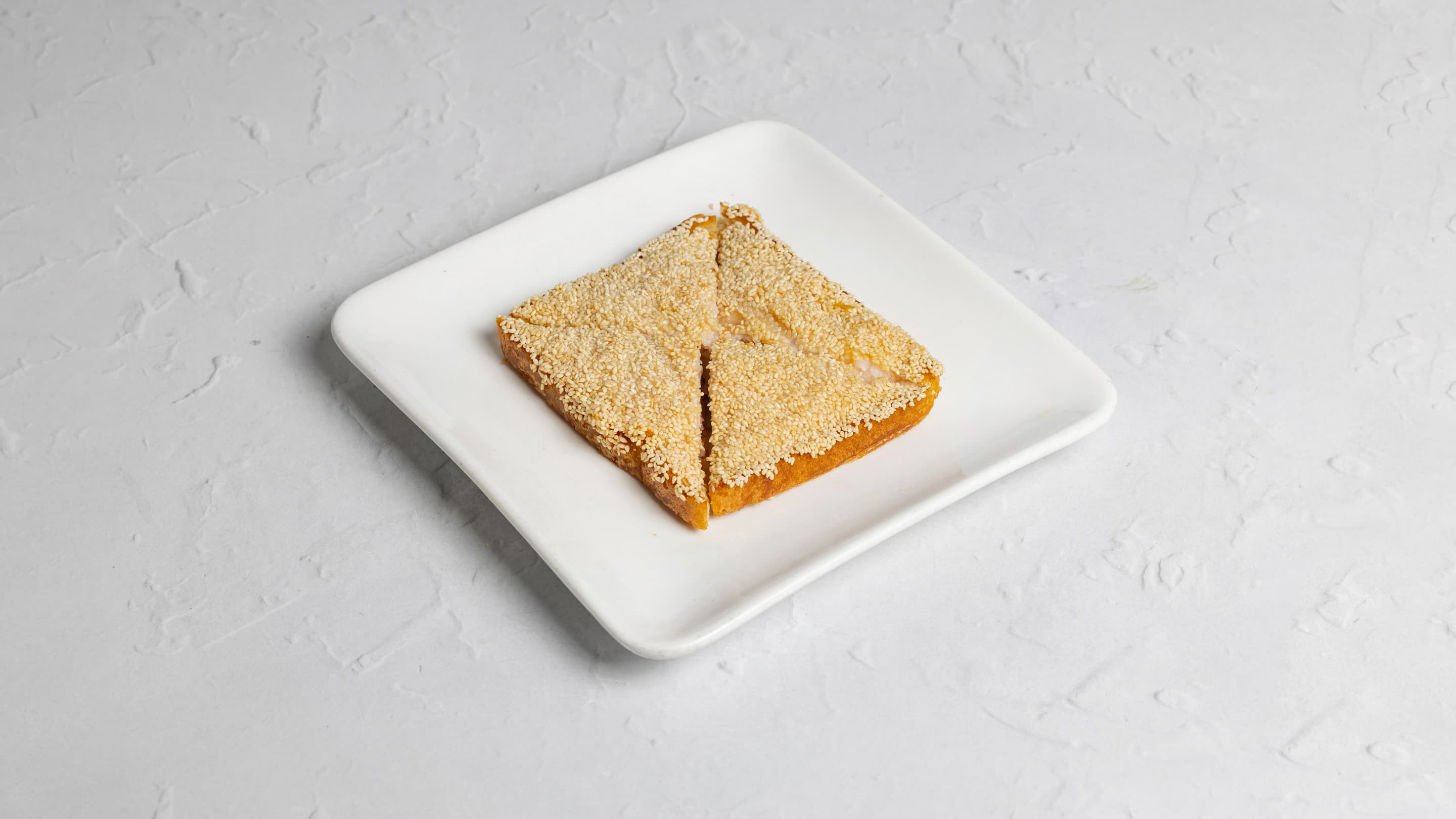 Prawn toast with sesame seeds at New Wok’s Cooking